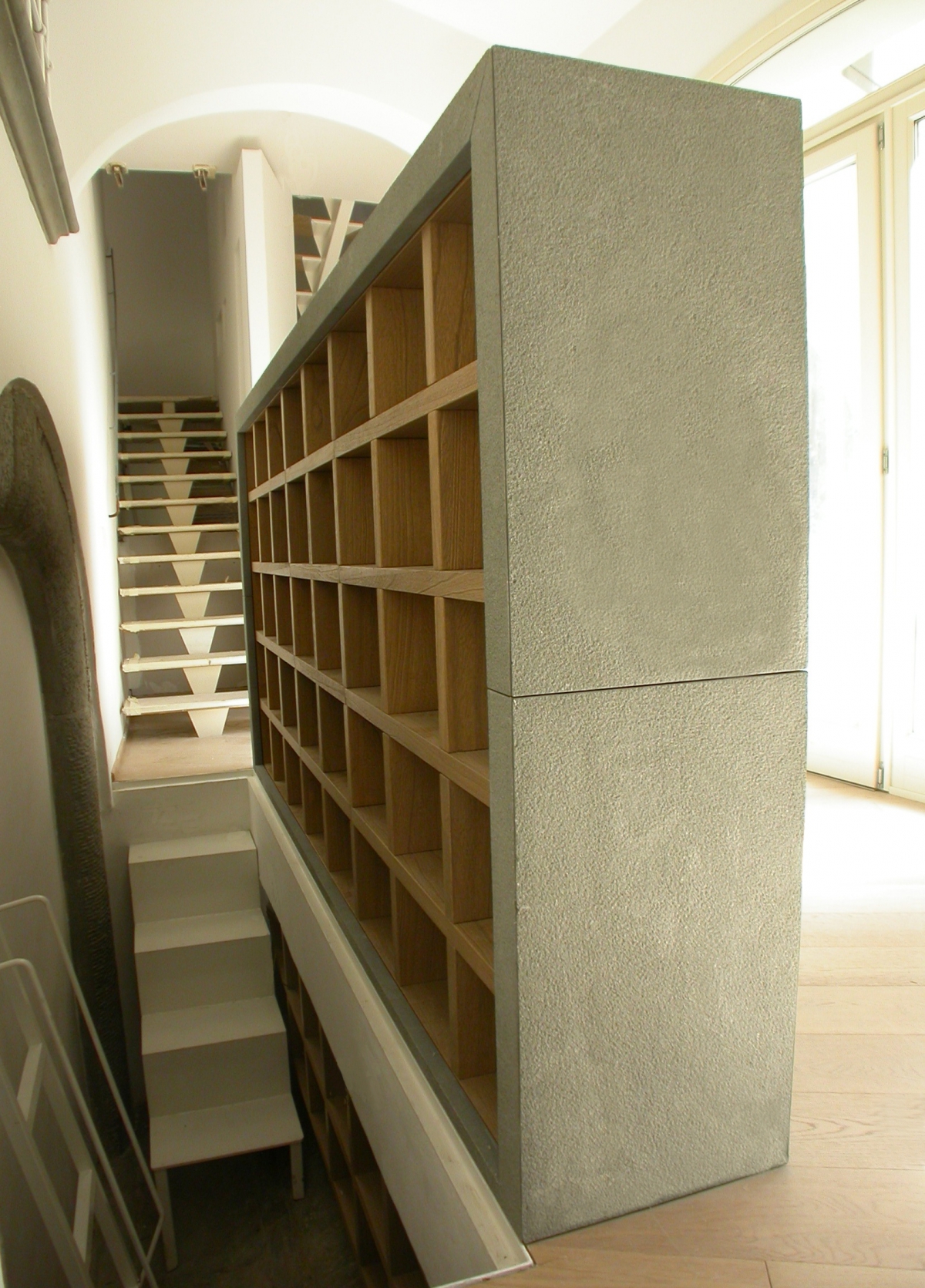 Cabinet of wood based on Pietra Macigno of Greve finishing bush-hammered